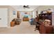Inviting living room featuring neutral colors, comfortable seating, ceiling fan, and well-lit space at 3460 Canvas St, Kissimmee, FL 34741
