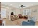 Inviting living room with tile floors, neutral walls, and comfortable sofas at 3460 Canvas St, Kissimmee, FL 34741