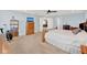 Comfortable main bedroom showing large bed, ceiling fan, and entrance to another room at 3460 Canvas St, Kissimmee, FL 34741