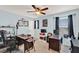 Office space featuring two wooden desks, a rolling chair, and neutral carpet at 3460 Canvas St, Kissimmee, FL 34741