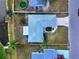 Straight-down aerial view showing the home's roof, driveway, and surrounding yard at 3719 Imperial Dr, Winter Haven, FL 33880