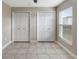 Neutral paint and tile floors adorn this bedroom at 3719 Imperial Dr, Winter Haven, FL 33880