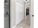 Hallway shot that shows bathroom and bedroom with tile flooring at 3719 Imperial Dr, Winter Haven, FL 33880