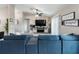 Comfortable living room with tile flooring, a media console, and a contemporary sectional sofa at 3719 Imperial Dr, Winter Haven, FL 33880