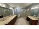 Gorgeous bathroom with double sinks, walk in shower and luxurious soaking tub at 495 King St, Haines City, FL 33844