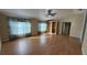 Large main bedroom with walk in closet, ceiling fan and light wood flooring at 495 King St, Haines City, FL 33844