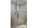 Tiled shower enclosure with glass door and modern fixtures at 495 King St, Haines City, FL 33844