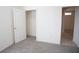 Bright bedroom features a large closet and neutral carpeting at 5062 Foxglove Cir, Lakeland, FL 33811