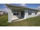 Exterior of home featuring an outdoor patio at 5062 Foxglove Cir, Lakeland, FL 33811
