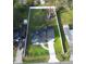 A top down view shows the home's position on an expansive lawn with a fenced perimeter at 515 Crevasse St, Lakeland, FL 33805