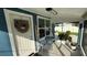 Screened porch with seating area, perfect for relaxing at 515 Crevasse St, Lakeland, FL 33805