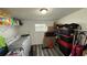 Laundry room with washer, dryer, and ample storage space at 515 Crevasse St, Lakeland, FL 33805