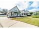 Charming two-story home with a well-manicured lawn and inviting curb appeal at 5155 Lake Deeson Woods Ct, Lakeland, FL 33805