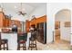 Bright kitchen featuring wooden cabinets, stainless steel appliances, and ample counter space at 5155 Lake Deeson Woods Ct, Lakeland, FL 33805