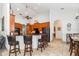 Open kitchen with wooden cabinetry, granite countertops, and stainless steel appliances at 5155 Lake Deeson Woods Ct, Lakeland, FL 33805
