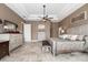 Generous main bedroom showcasing a trey ceiling, decorative fan, neutral paint, and tiled floors at 5155 Lake Deeson Woods Ct, Lakeland, FL 33805