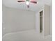 The bedroom offers a neutral color scheme, tile flooring, and a convenient closet for storage at 519 Eagle Ct, Kissimmee, FL 34759