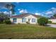 Charming single-story home featuring a well-maintained lawn and traditional architectural details at 519 Eagle Ct, Kissimmee, FL 34759