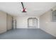 Spacious garage with water heater, mechanicals, and access to the house through the back door at 519 Eagle Ct, Kissimmee, FL 34759