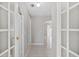 Hallway with tile flooring and multiple doorways at 519 Eagle Ct, Kissimmee, FL 34759