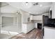 Open-concept kitchen featuring modern appliances and seamless flow to the living area at 519 Eagle Ct, Kissimmee, FL 34759