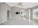 Bright living area featuring open access to the kitchen and front entrance at 519 Eagle Ct, Kissimmee, FL 34759