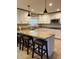 Bright kitchen featuring granite countertops, stainless steel appliances, and a breakfast bar at 528 Laurel Ln, Lakeland, FL 33813