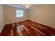 Bedroom with hardwood floors and a ceiling fan at 600 Caribbean Dr, Lakeland, FL 33803