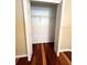 View of the closet with hardwood floors and storage at 600 Caribbean Dr, Lakeland, FL 33803