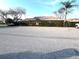 A low-profile home with a meticulously maintained hedge in a well-kept neighborhood at 600 Caribbean Dr, Lakeland, FL 33803