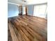 Open living space featuring hardwood flooring and neutral paint colors at 600 Caribbean Dr, Lakeland, FL 33803