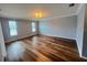 Living room featuring two large windows bringing in natural light at 600 Caribbean Dr, Lakeland, FL 33803