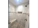 Close up of the stand up shower featuring upgraded tile at 600 Caribbean Dr, Lakeland, FL 33803