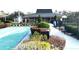 Community shuffleboard court with benches, offering a fun recreational activity at 600 Caribbean Dr, Lakeland, FL 33803