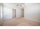 Bright bedroom featuring neutral carpet, a ceiling fan, a double door closet, and lots of natural light at 6011 Placid Pass, Lakeland, FL 33805