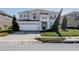 Charming two-story home featuring a two-car garage and well-manicured landscaping at 6011 Placid Pass, Lakeland, FL 33805