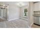 Light-filled dining area with vinyl plank flooring at 629 7Th W St, Lakeland, FL 33805
