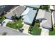 Aerial view of single Gathering home with a well maintained lawn and a two car driveway at 6962 Starmount Dr, Lakeland, FL 33810