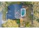 House with pool and fenced backyard, as seen from above at 7026 Parliament Pl, Lakeland, FL 33809