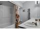 Bathroom with double vanity and a shower/tub combo at 7026 Parliament Pl, Lakeland, FL 33809