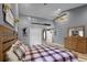 Bright bedroom with a king-size bed and ample closet space at 7026 Parliament Pl, Lakeland, FL 33809