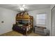 Bedroom with bunk beds and plenty of toy storage at 7026 Parliament Pl, Lakeland, FL 33809