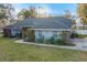 Well-maintained home with a large yard and mature trees at 7026 Parliament Pl, Lakeland, FL 33809