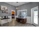 Kitchen nook with wood desk and views into other rooms at 7026 Parliament Pl, Lakeland, FL 33809