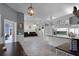 Open kitchen with island and view of living room at 7026 Parliament Pl, Lakeland, FL 33809