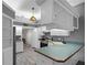 Kitchen with stainless steel appliances and white cabinets at 7026 Parliament Pl, Lakeland, FL 33809