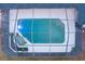 Aerial view of a screened-in pool and deck at 7026 Parliament Pl, Lakeland, FL 33809