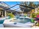 Relaxing spa with tiled water feature and lush landscaping at 7026 Parliament Pl, Lakeland, FL 33809