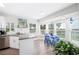 Lovely kitchen with stainless steel appliances, granite countertops, and a bright breakfast nook at 705 Lake Ada Blvd, Dundee, FL 33838