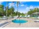 Relaxing outdoor pool featuring lounge chairs and a serene atmosphere at 116 Ocean Bluff Dr # 116, Kissimmee, FL 34759